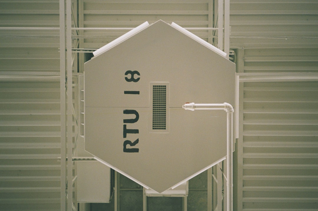 A for sale sign in front of a house.