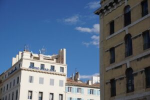 A house exterior decorated for the holidays.